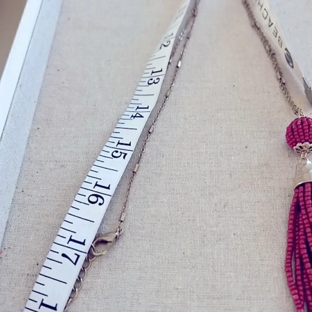 New. Gold necklace with Burgundy Red Beaded Tassel